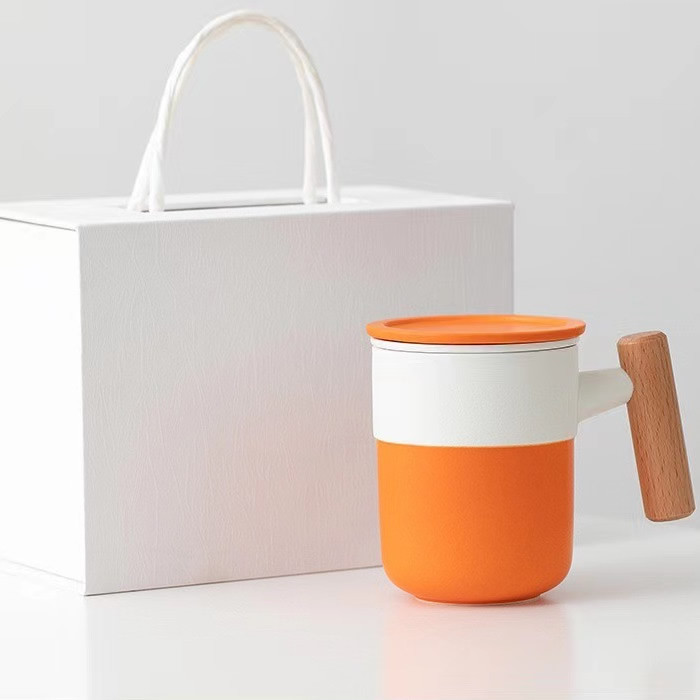 Orange white two-color ceramic wooden handle tea water separation office personal coffee tea mugs